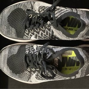 Black and white Nike Free